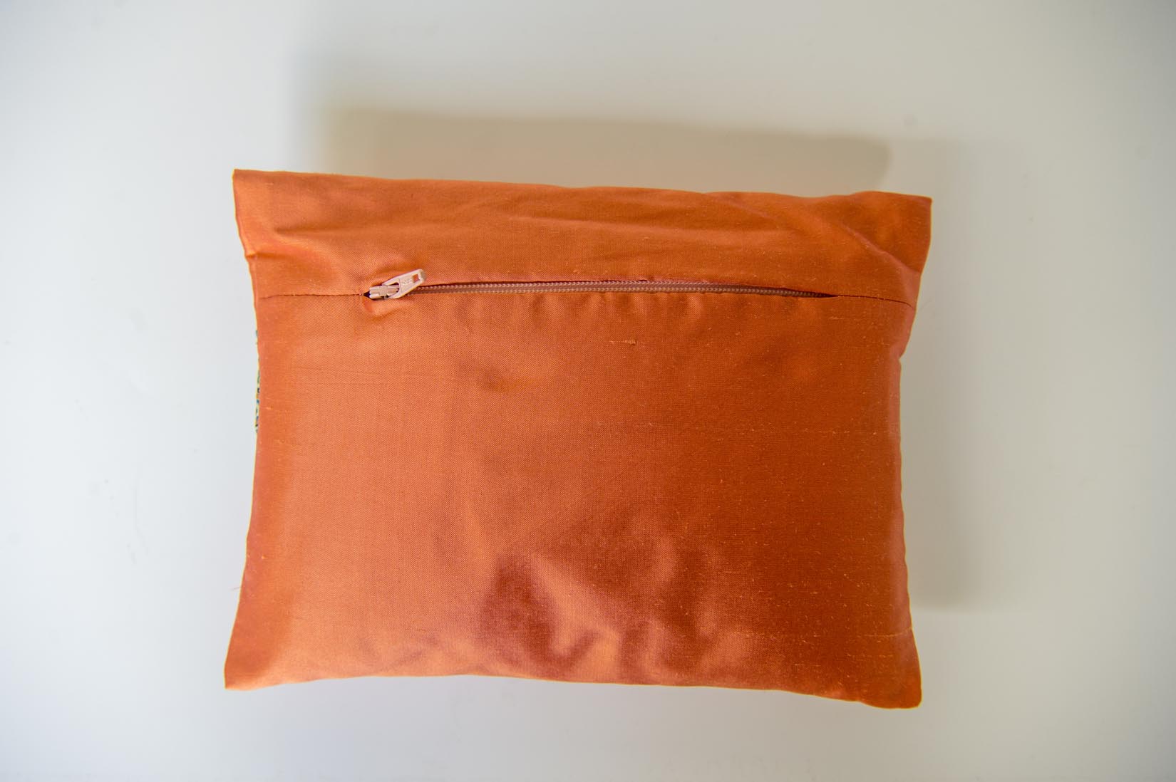 "Plumes Paon" orange silk envelope cushion